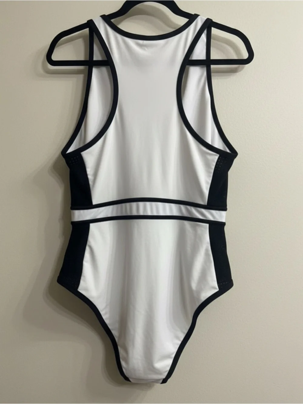 Woman’s White and Black Zip-Front One-Piece Swimsuit